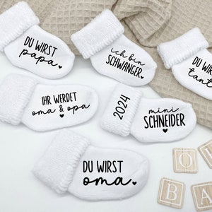 Baby sock pregnancy announcement with desired text I optionally with personalized linen bag I different print and sock colors