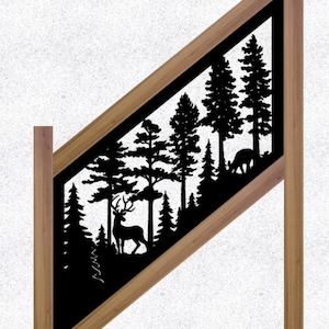 May include: A wooden frame with a black silhouette of a forest scene. The design features trees, a deer with antlers, and another deer. The frame is angled and has a natural wood finish.