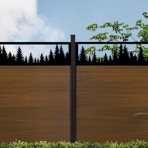 May include: A wooden fence with a black metal top featuring a silhouette of a forest. The fence has vertical black posts and a natural wood grain finish. Green plants and a blue sky are visible in the background.