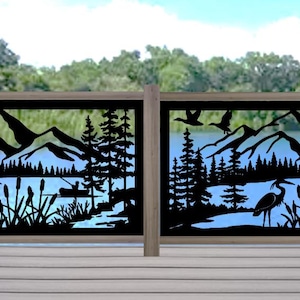 May include: Two decorative metal panels with a nature scene. The black cutouts depict mountains, trees, a lake, birds, and a fisherman in a boat. The background shows a blue sky and a lake with trees.