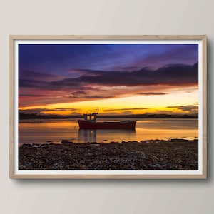 Coucher de soleil sur le bassin de Montrose avec bateau au premier plan
