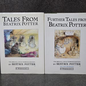 May include: Two hardback books, "Tales From Beatrix Potter" and "Further Tales From Beatrix Potter," are shown. The covers are white with illustrations of rabbits and mice. The text on the covers includes the title and author's name, with the publisher's logo.