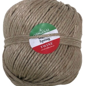 May include: A ball of natural brown twine with a red, white, and green label that reads "Original Italian Spring Twine".