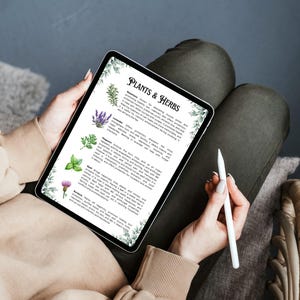 May include: A digital tablet displaying a list of plants and herbs with watercolor illustrations and descriptions. The tablet is titled "Plants & Herbs".