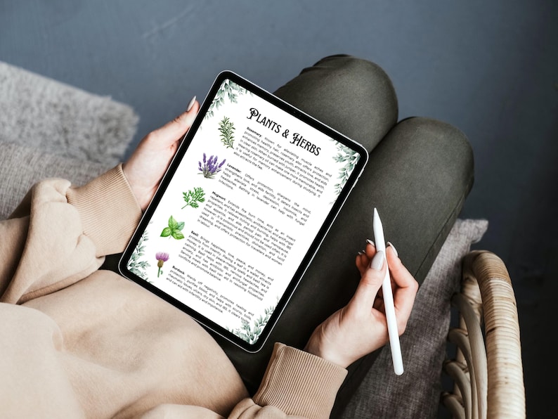 May include: A digital tablet displaying a list of plants and herbs with watercolor illustrations and descriptions. The tablet is titled "Plants & Herbs".