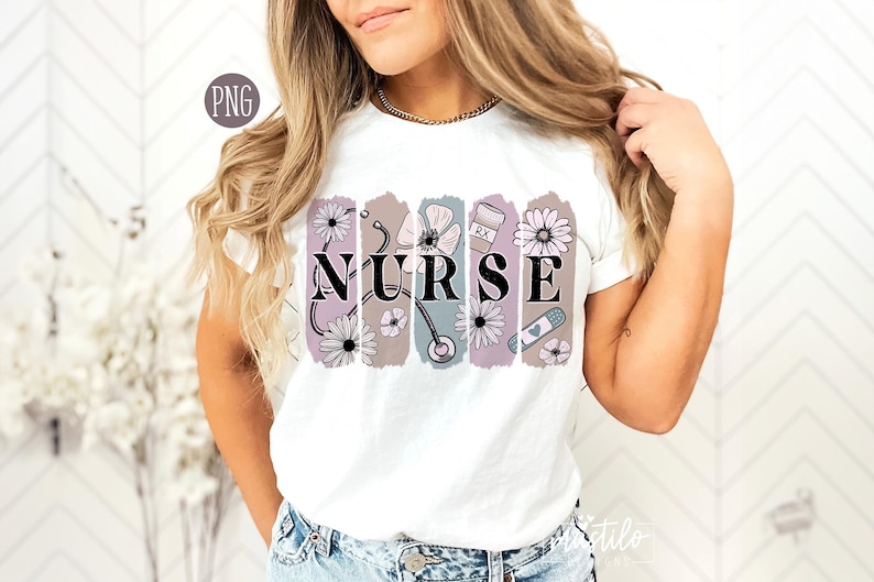 May include: White t-shirt with a floral design and the word "NURSE" printed on it. The design includes a stethoscope, a bandage, and a pill bottle.