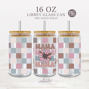 May include: Three 16 oz. glass can wraps with a checkered pattern in pink, brown, and blue. The center wrap features a pink flower with the word "Mama" in pink and white letters.