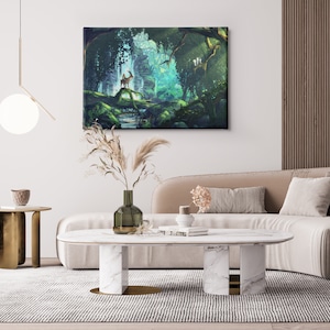 May include: A canvas art print depicting a serene forest scene with a deer standing on a mossy rock near a stream. The artwork features lush green foliage, sunlight, and a soft, dreamlike quality. The print is displayed above a beige sofa in a modern living room.
