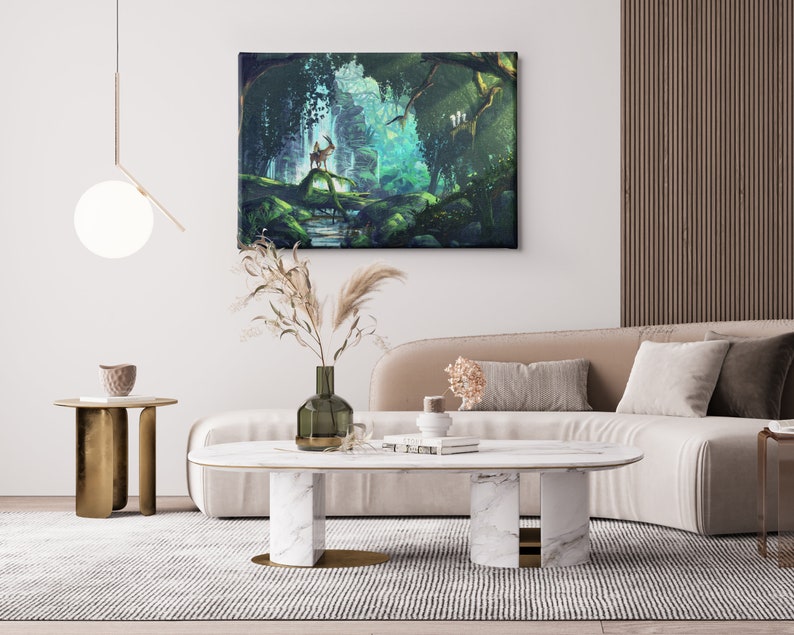 May include: A canvas art print depicting a serene forest scene with a deer standing on a mossy rock near a stream. The artwork features lush green foliage, sunlight, and a soft, dreamlike quality. The print is displayed above a beige sofa in a modern living room.