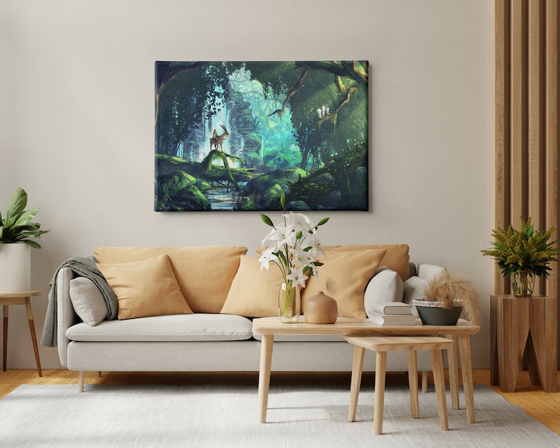 May include: A canvas print depicting a fantasy forest scene with a deer-like creature standing on a mossy log. The artwork features lush green foliage, a flowing stream, and a vibrant, ethereal glow. The print is displayed above a light-colored sofa with yellow pillows.