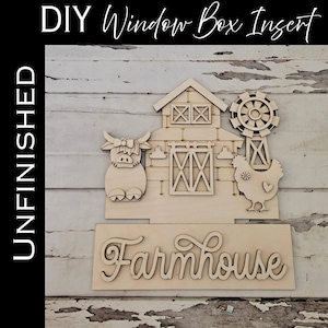Peut inclure: Insert de boîte à fenêtre de ferme à faire soi-même non fini. La découpe en bois représente une grange, un moulin à vent, une vache et une poule. Le mot "Farmhouse" est affiché en cursive. Le texte "DIY Window Box Insert" et "Unfinished" sont également visibles.