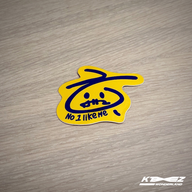 May include: Yellow sticker with a blue cartoon face and the text "No 1 like me".