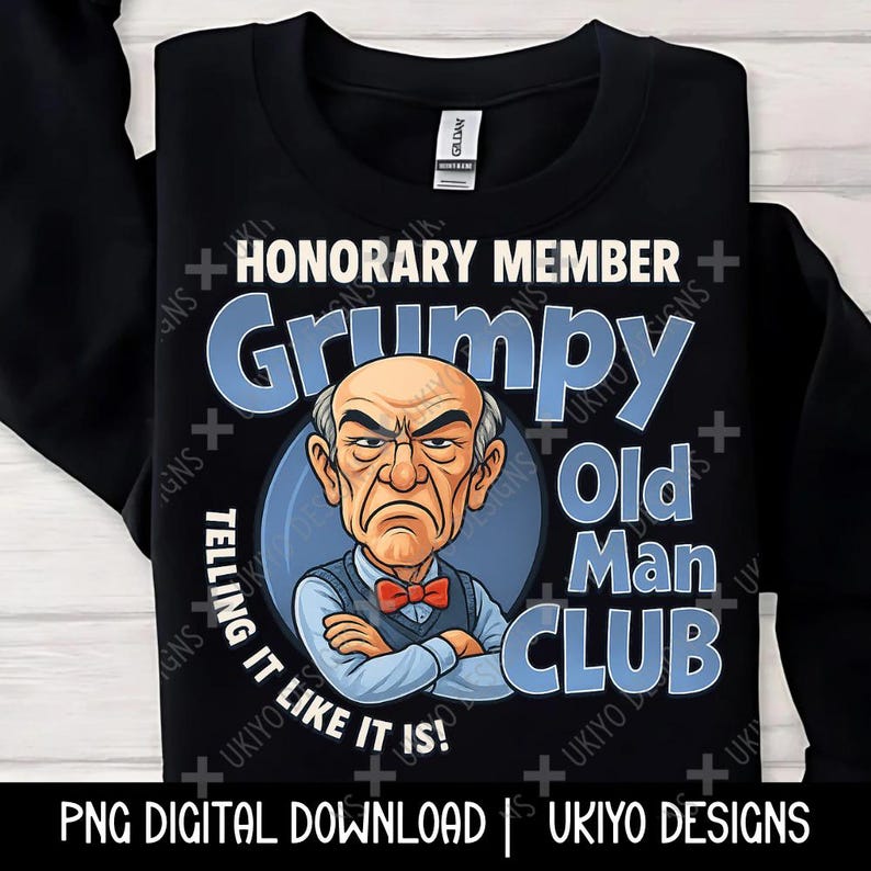 May include: Black sweatshirt with a graphic that reads "Honorary Member Grumpy Old Man Club." The design features a cartoon of a grumpy-looking man with crossed arms, a bow tie, and the text "Telling it like it is!"