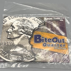 May include: A clear plastic bag containing a magic trick. The trick is a "BiteOut Quarter illusion" with a quarter coin image. The packaging includes the text "MAGIC MAKERS" and a partial image of George Washington.