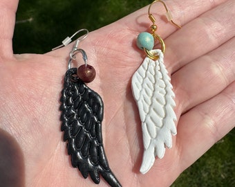 Pendientes de alas de buenos presagios