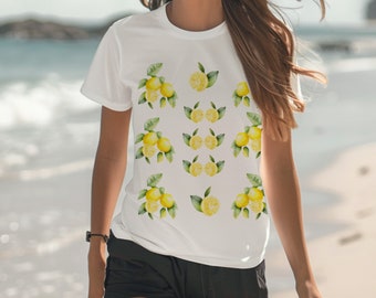 May include: White t-shirt with a repeating pattern of yellow lemons and green leaves.