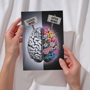 May include: A print depicting a human brain split in half, with one side labeled "CLOSED MIND" and the other "OPEN MIND." The "CLOSED MIND" side is gray, while the "OPEN MIND" side is colorful with flowers.