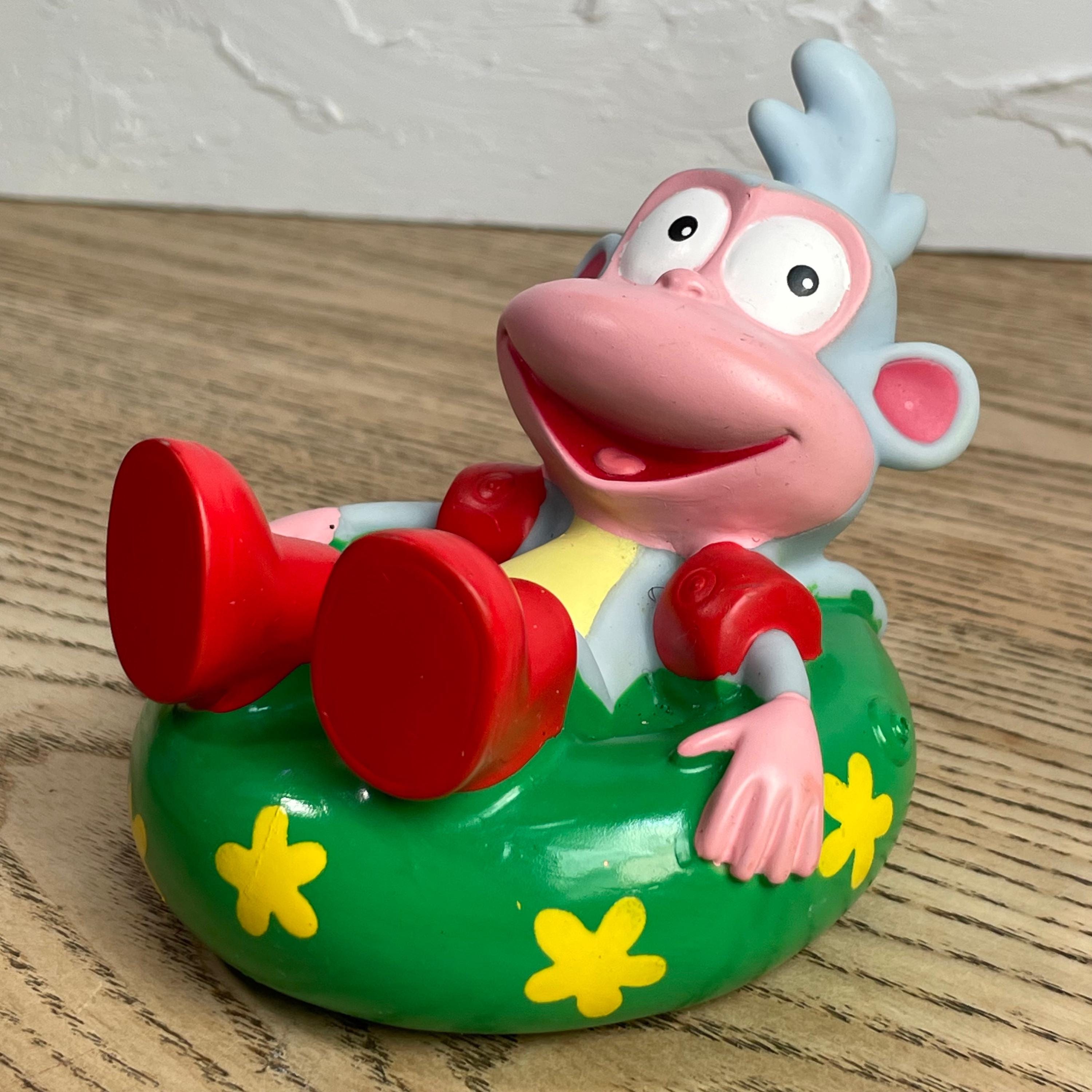 2000s Dora the Explorer Boots Floating on Tube Toy -- Vintage Dora
