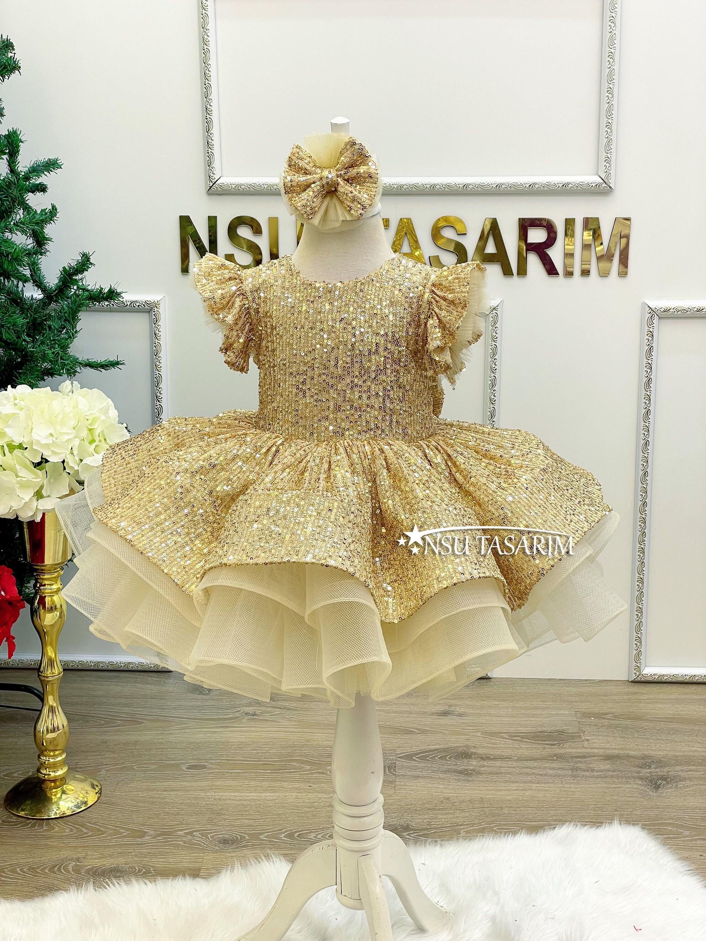 Shimmer in Style: Our Gold Sequin Holiday Dress for Girls, Glittering in Gold Christmas Dress for Your Little Princess. Gold Baby Girl Dress Shimmer in Style: Our Gold Sequin Holiday Dress for Girls, Glittering in Gold Christmas Dress for Your Little Princess. Gold Baby Girl Dress