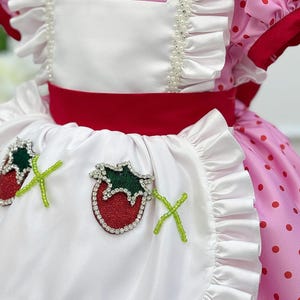 Pink toddler dress with embroidered strawberries