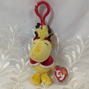 Clip de Ty Beanie Baby - Winter Woodstock, El pájaro amarillo de Peanuts (11,4 cm)
