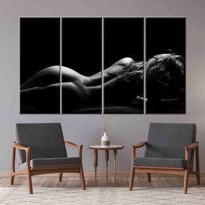 May include: A black and white photo of a person lying on their stomach with their hair covering their face. The photo is split into three sections.
