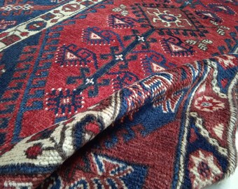 ヴィンテージ バルーチウールラグ：動物モチーフの4x7 ブルー