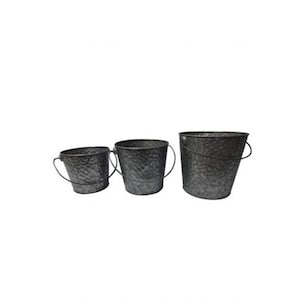 May include: Three galvanized metal buckets with handles. The buckets are different sizes and have a hammered finish.