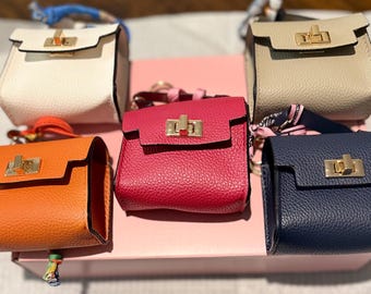 Mini keychain bag for backpack with brand charms