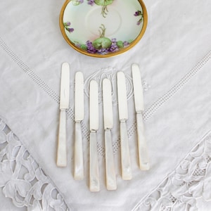 Antique cased set of 6 Solid Silver Tea or Butter Knives with Art Deco Carved Mother of Pearl handles
