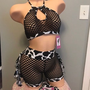 Cow print & black outfits (scroll to see more styles)