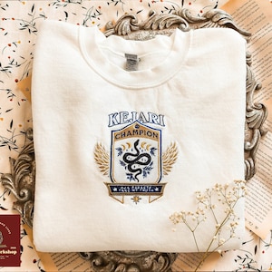 Kejari-geborduurd sweatshirt, The Serpent and The Wings of Night-leessweater, officiële Carissa Broadbent-merchandise, cadeau voor boekenliefhebbers