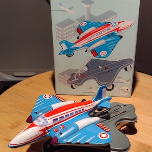 Aircraft toy, tin rewindable, moving and0 take off