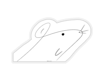 May include: A white sticker featuring a minimalist line drawing of a mouse's head. The design includes a curved ear, a small eye, and whiskers. The sticker has a white border and a simple, modern aesthetic.