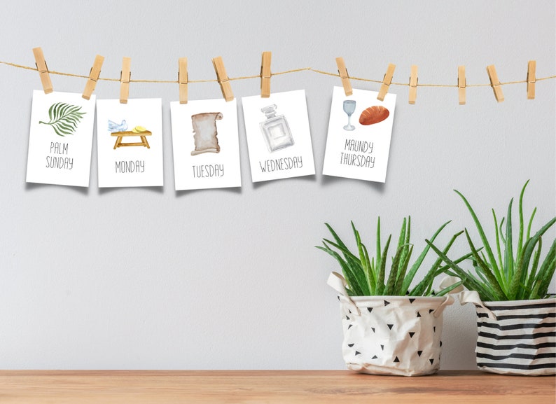 May include: Five white cards with watercolor illustrations and text hanging on a string with clothespins. The cards read "Palm Sunday", "Monday", "Tuesday", "Wednesday", and "Maundy Thursday".