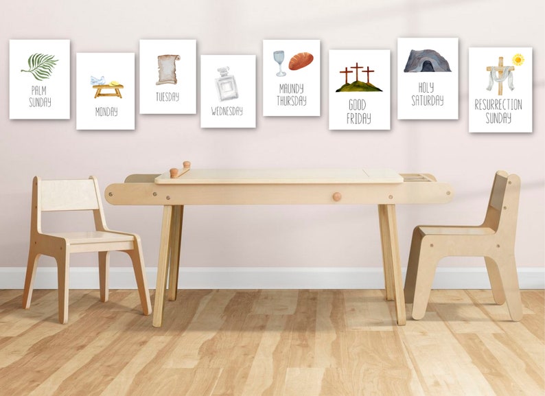 May include: A set of eight printable wall art prints featuring illustrations and text related to the Christian holiday of Easter. The prints are displayed on a wall above a wooden table and chairs.