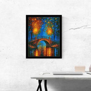 May include: A framed painting depicts a bridge over water at night. The artwork features warm colors, with orange and yellow lights reflecting in the water. Trees with colorful foliage frame the bridge, set against a blue sky.