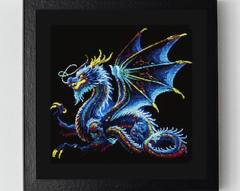 May include: A framed cross-stitch artwork depicting a blue and yellow dragon with outstretched wings against a black background.