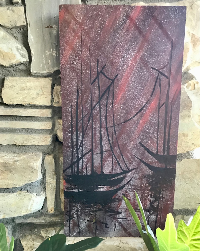 May include: Abstract painting of three sailboats in a dark, starry sky with red and white streaks of color. The sailboats are silhouetted against the sky and are reflected in the water below.