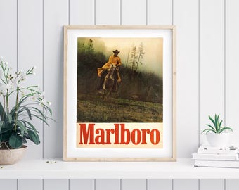 May include: A vintage Marlboro advertisement featuring a cowboy riding a horse through a foggy forest. The text "Marlboro" is printed in red letters at the bottom of the image.