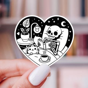 Skeleton Reading with Cat Vinyl Sticker: Spooky Book Lover Gift