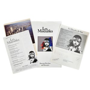 May include: A set of four printed pages for the Broadway musical Les Misérables. The pages include a cast list, a synopsis, and a mail order form. The pages feature a black and white illustration of a young girl with windblown hair.