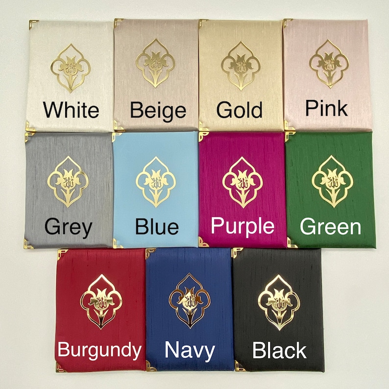 May include: A set of 10 small, square, fabric-covered boxes with gold trim and a gold floral design. The boxes are in various colors, including white, beige, gold, pink, grey, blue, purple, green, burgundy, navy, and black.