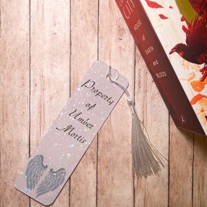 Property of Umber Mortis holographic bookmark