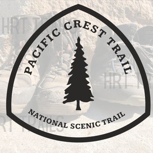 May include: A black and white logo for the Pacific Crest Trail, a National Scenic Trail. The logo features a stylized pine tree and the words "Pacific Crest Trail" and "National Scenic Trail".
