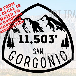 May include: Black and white sticker with a mountain range design and the text "11,503' SAN GORGONIO". The sticker is a fundraiser for the San Gorgonio Wilderness Association.