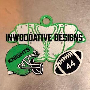 May include: A green and white football shoulder pad, a green football helmet with "Knights" text, and a black and white football with the number 44. The text "INWOODATIVE DESIGNS" is above the shoulder pad.