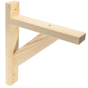 May include: A natural wood shelf bracket with a triangular shape and three pre-drilled holes. The bracket is made of unfinished pine wood.
