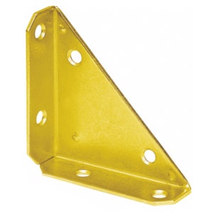 May include: A gold metal corner brace with five holes for screws. The brace is a right angle and has a smooth, shiny finish.