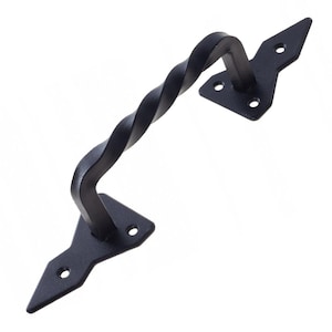 May include: Black metal door handle with a twisted design and diamond-shaped plates.